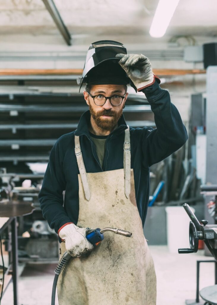 portrait of metalworker holding welding torch in forge workshop rjc0zuz7zycqvo3mdt8igaxrqp2tmu9ww9eoky6r3k