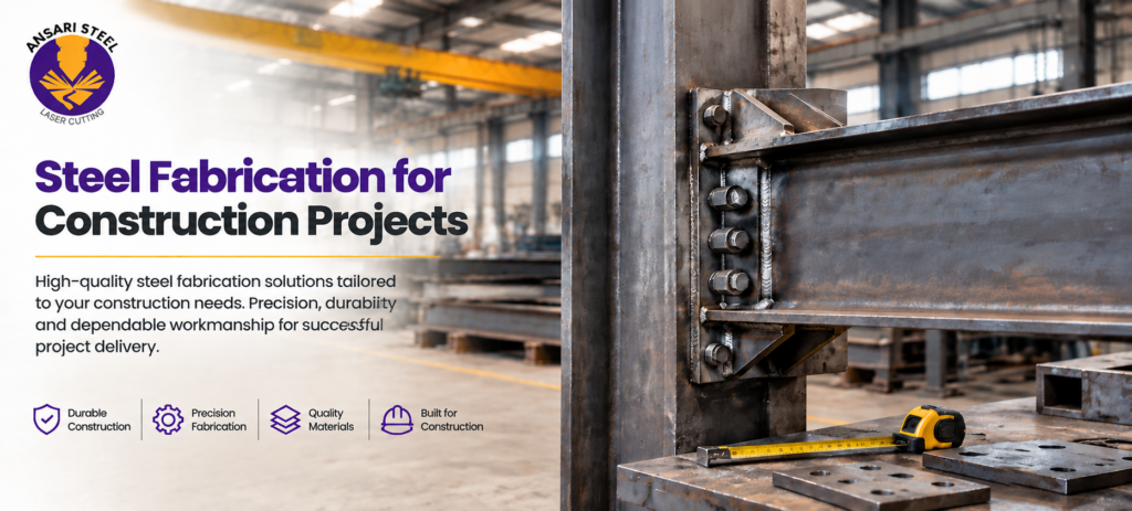 Steel fabrication for construction projects featuring a structural steel beam and column connection inside a professional fabrication workshop